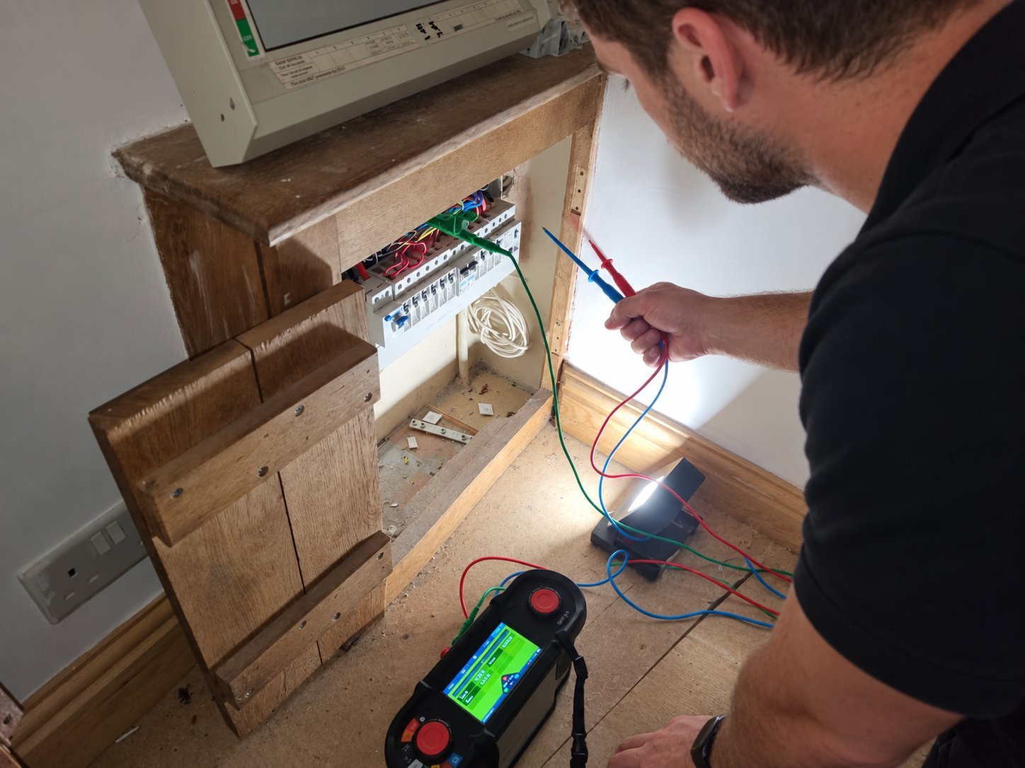 Neatly wired RCBO consumer unit in a Sussex home, the standard an EICR tests against